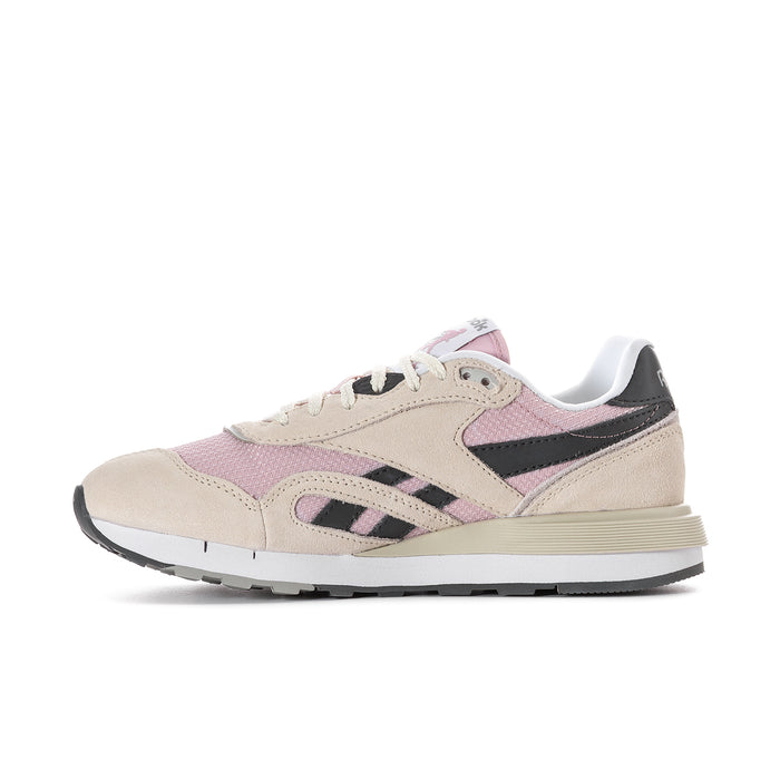 Women's Reebok low-top sneakers, side profile with pink panels and black stripes