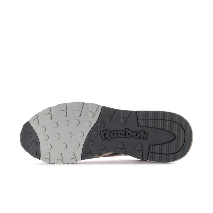 Women's Reebok sneaker outsole with black and light-gray rubber tread