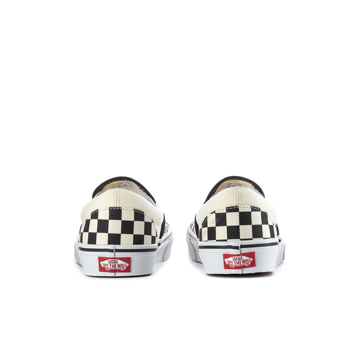 Vans slip-on sneakers in black/white checkerboard with rear label, white rubber sole