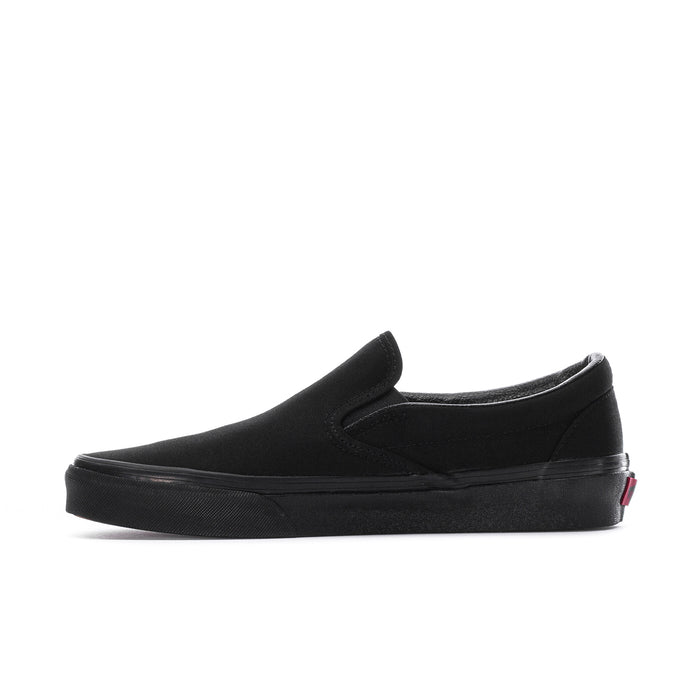 Black slip-on sneakers side view with elastic gore and low rubber sole