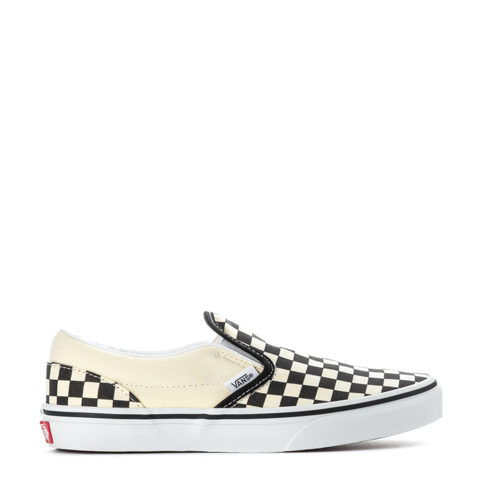 Youth slip-on sneakers with black-and-white checkerboard canvas and white rubber sole