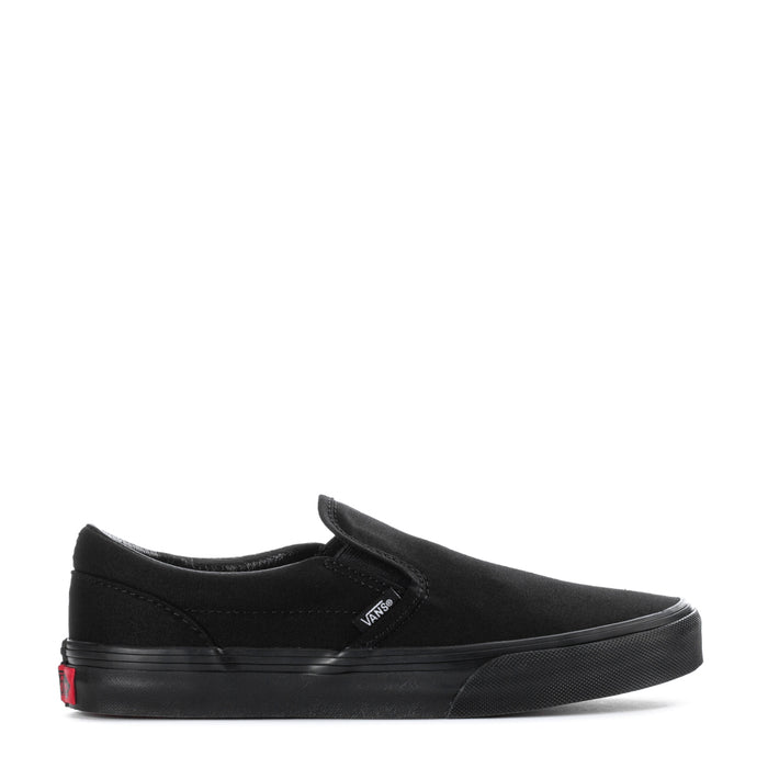 Vans youth black canvas slip-on sneakers, side logo and elastic gore at collar