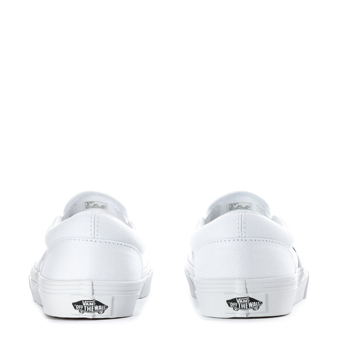 Youth white slip-on sneakers, back view with branded heel tabs and rubber sole