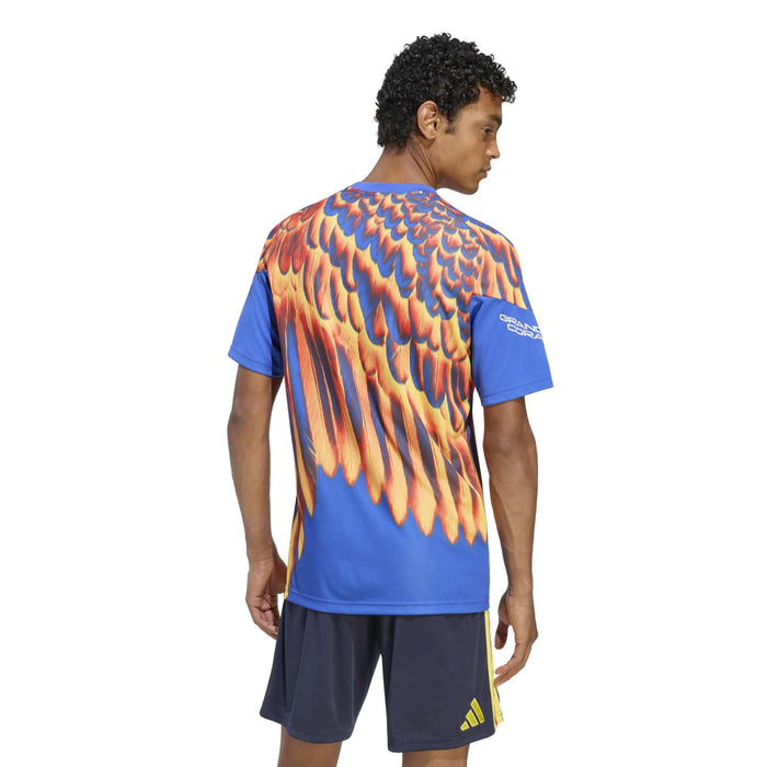 Men's pregame jersey back view with flame-feather print and 'GRANDE CORAZON' sleeve text