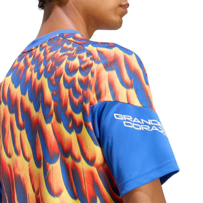 Men's pregame jersey shoulder detail with flame-feather print and 'GRANDE CORAZON' sleeve