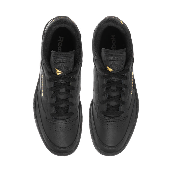 Black leather sneakers with laces and Reebok branded tongues