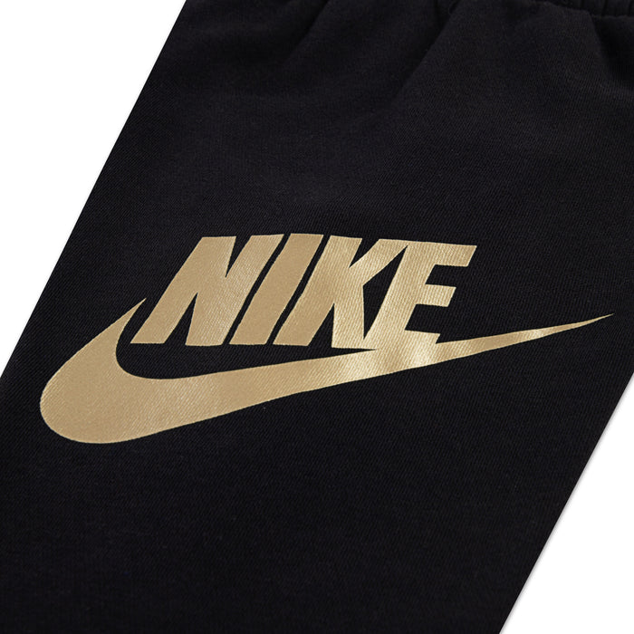 Black Nike swoosh logo on toddler hoodie, gold print on dark fabric