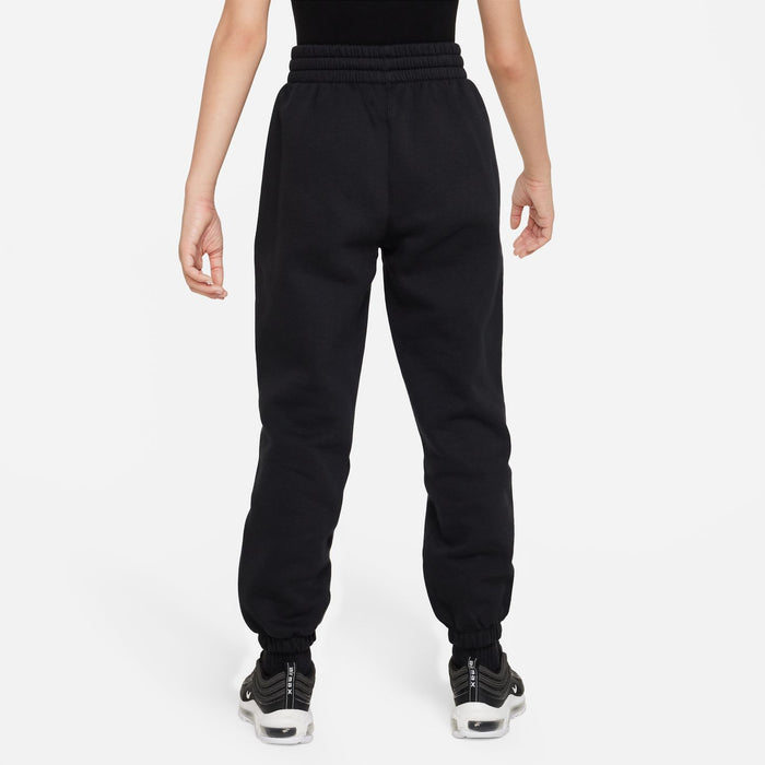 Youth black loose sweatpants, back view, elastic waistband and ribbed cuffs