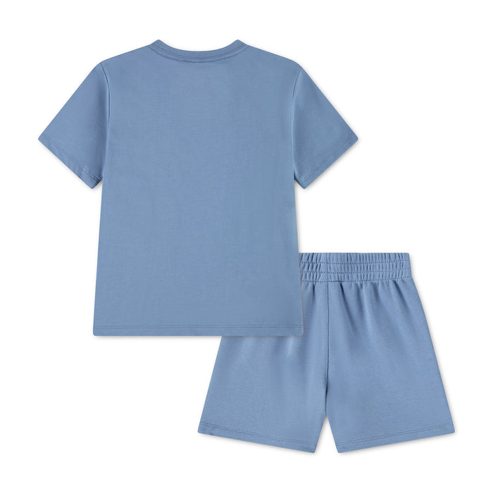 Toddler light blue Nike short-sleeve T-shirt and elastic-waist shorts set, rear
