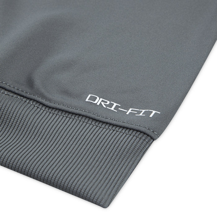 Dri-FIT logo on smoke grey jogger cuff hem.