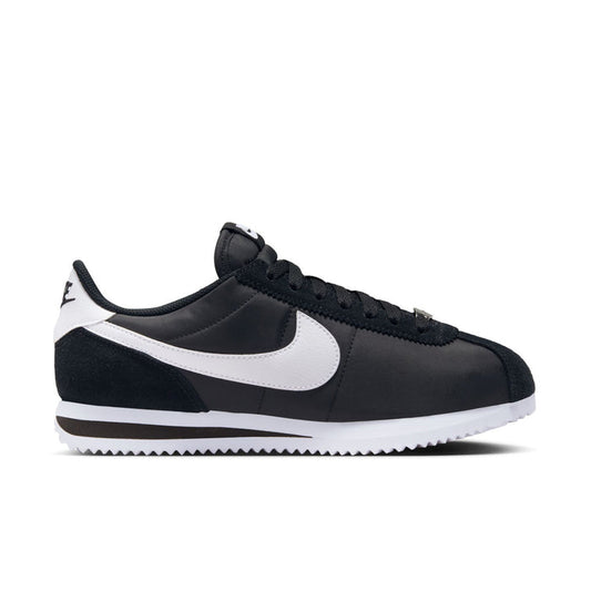 Women's Cortez low-top sneakers in black with white Swoosh and lace-up design