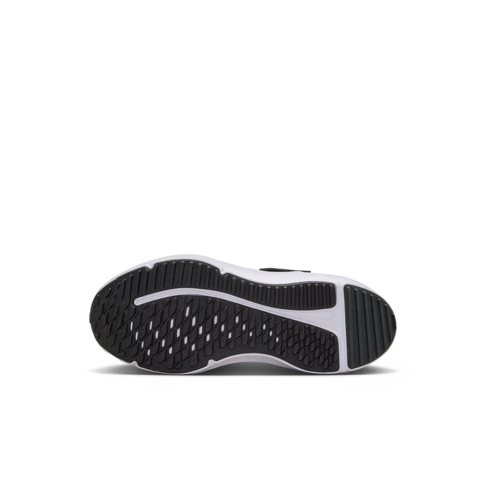 Kids black outsole with tread pattern and white midfoot edge