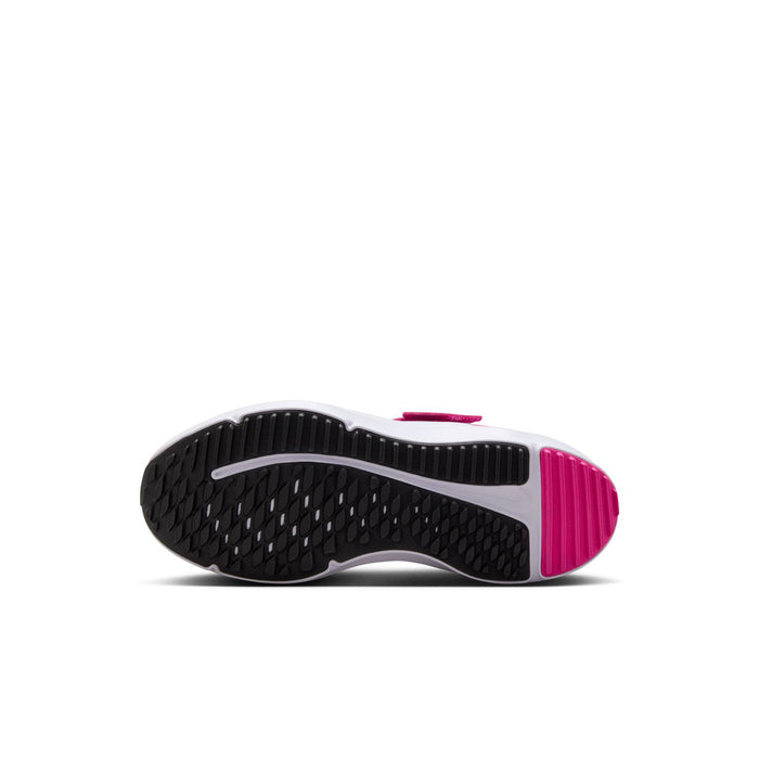 Kids sneaker outsole view: black tread with pink sidewall stripe.