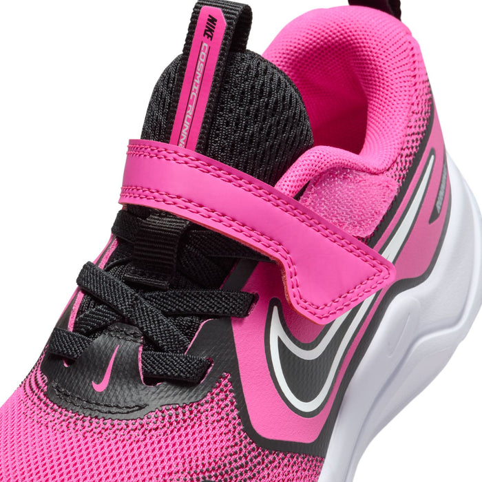 Kids sneaker side close-up with laser fuchsia straps, black laces, and swoosh.