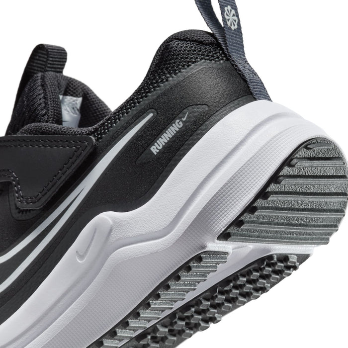 Kids black running shoe side close-up with “RUNNING” text and tread sole