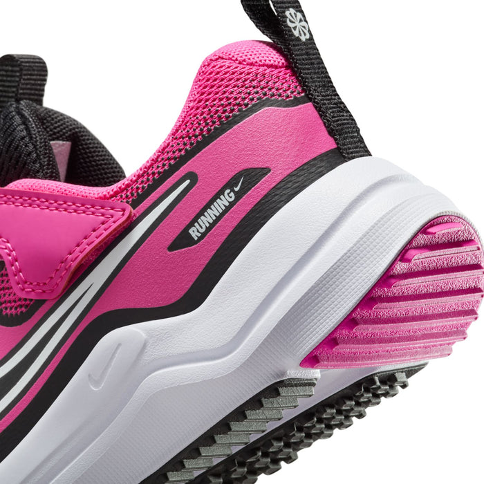 Kids sneaker heel and sole close-up, textured traction with pink accent stripe.
