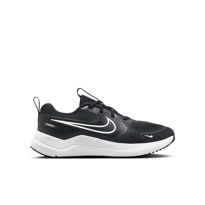 Youth black and white running shoe with mesh upper, lace-up front, and white midsole