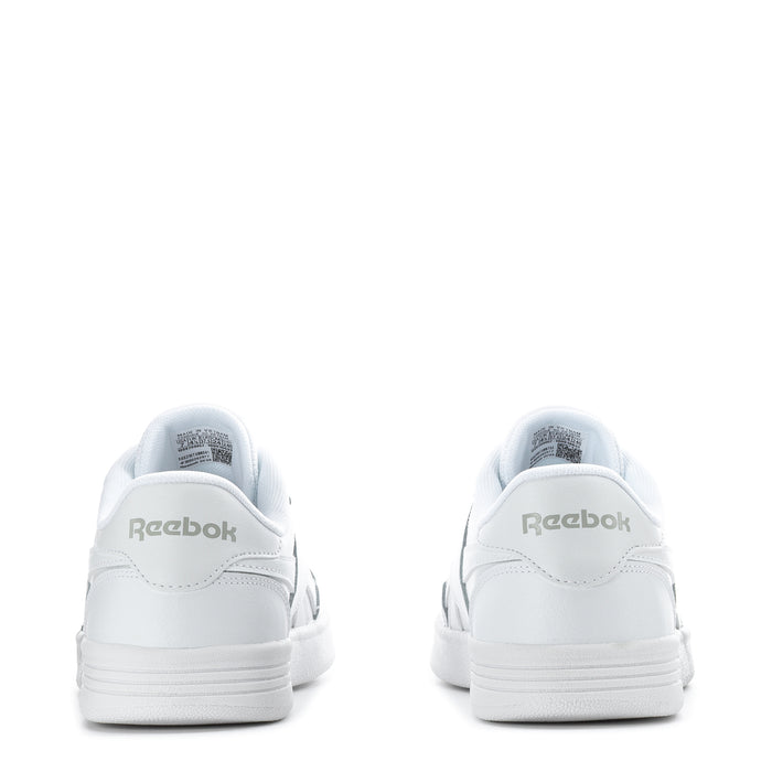 Women's white sneakers with heel tab and Reebok logo on the back