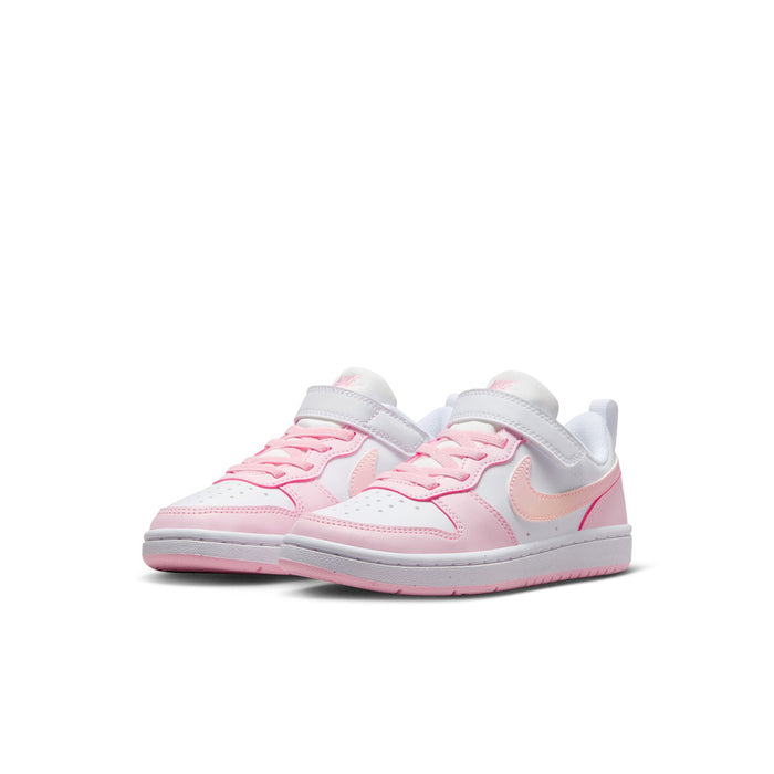 Kids low-top sneakers, side view in white with pink accents and hook-and-loop strap