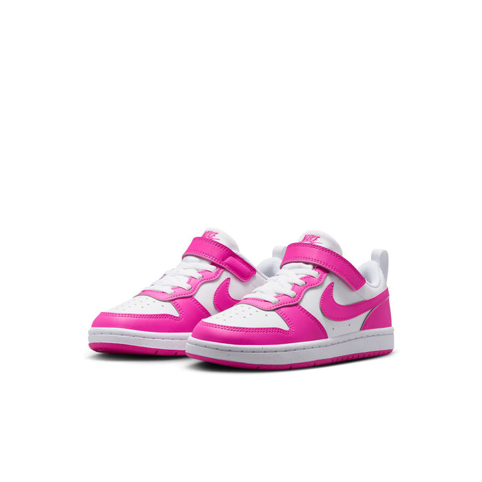 Kids low-top sneakers, side view, white uppers with laser fuchsia accents and strap