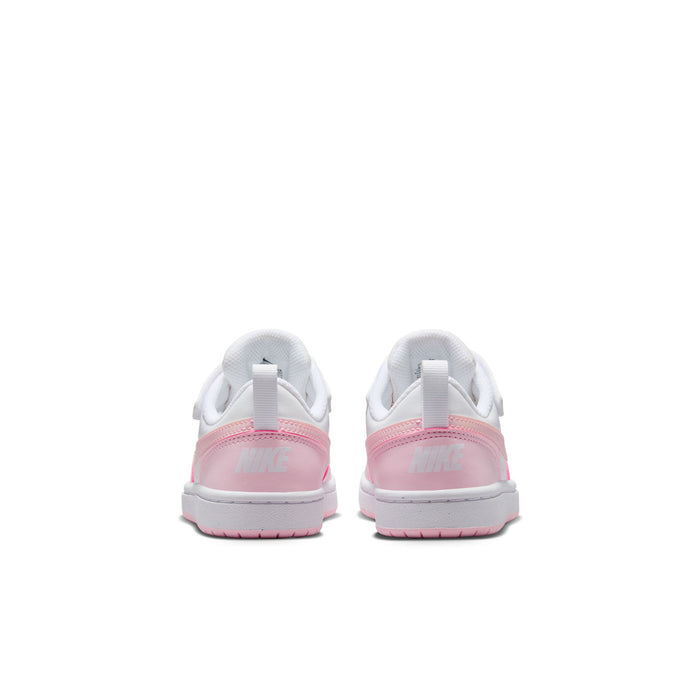 Kids low-top sneakers, heel view in white with pink trim and adjustable strap