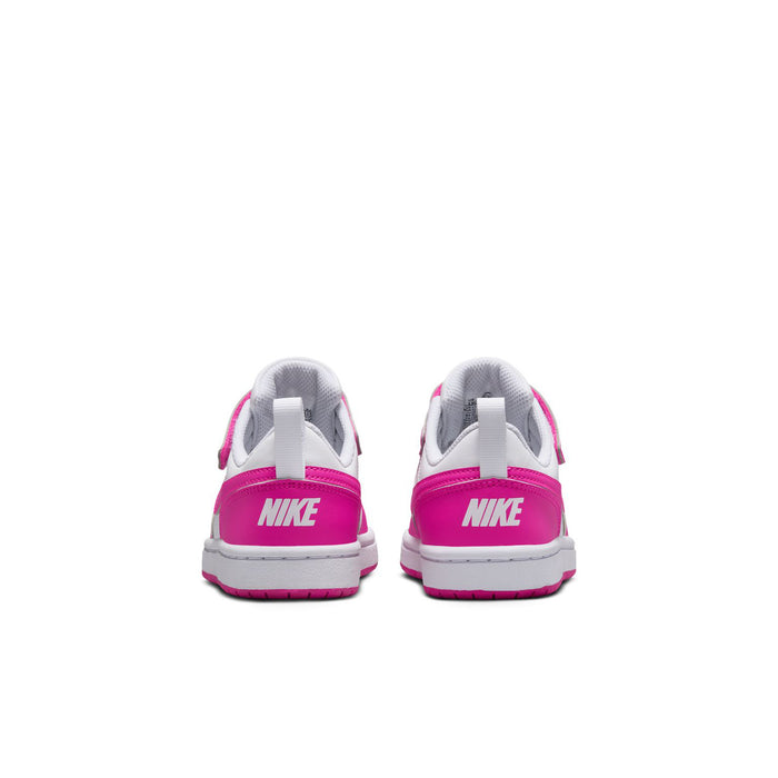 Kids low-top sneakers, rear view with NIKE heel tag and pink heel counter
