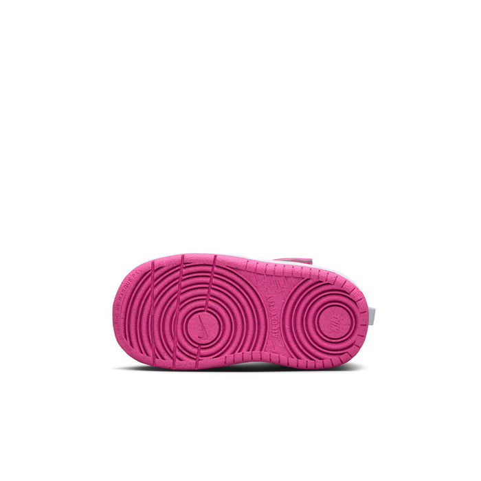 Toddler sneaker outsole with textured grip and bright laser fuchsia tread