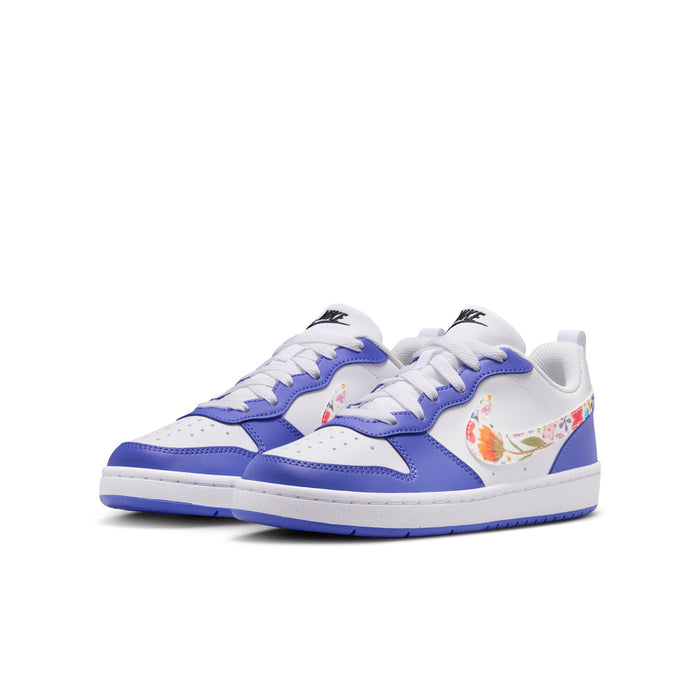 Pair of youth low-top sneakers, white and blue uppers with colorful graphic detail