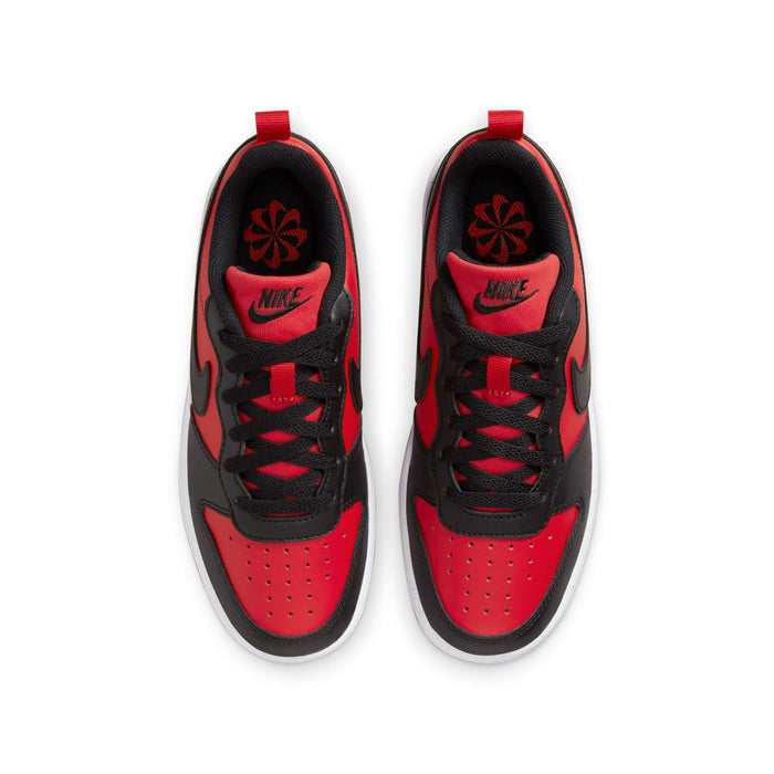 Youth red and black sneakers with black laces and padded tongues, top view.