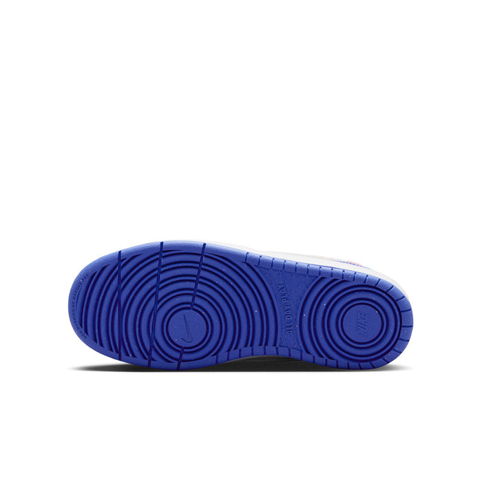 Youth sneaker outsole in dark blue with circular traction pattern