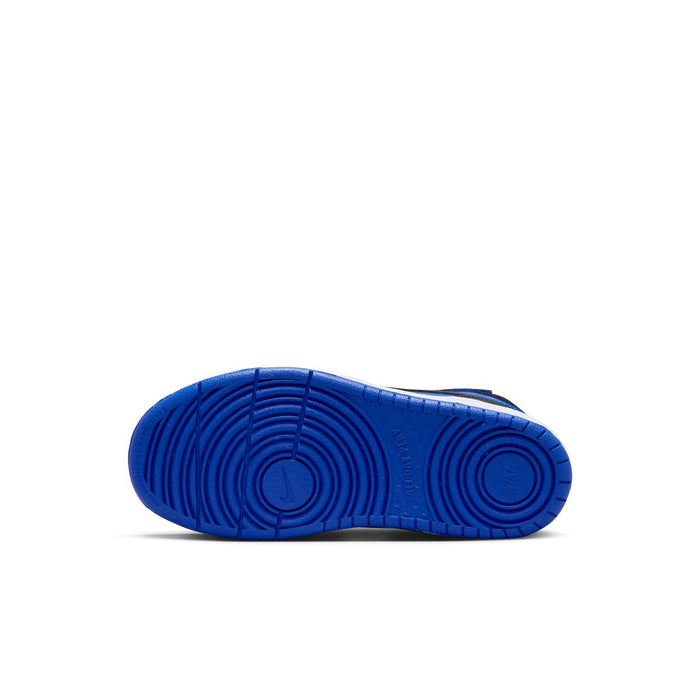 Kids mid-top sneaker outsole in royal blue with tread pattern