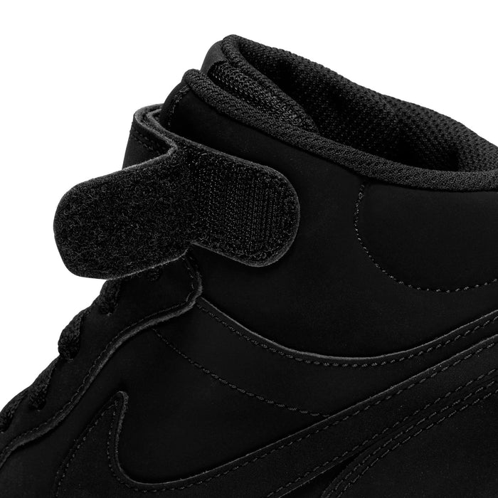 Black mid-top sneaker for youth, close-up of ankle collar and hook-loop strap