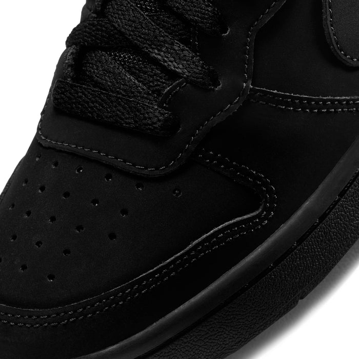 Black mid-top sneaker for youth, close-up of toe perforations and stitched Swoosh