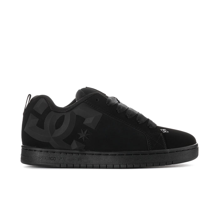 Black low-top skate sneakers with DC star logo and lace-up closure