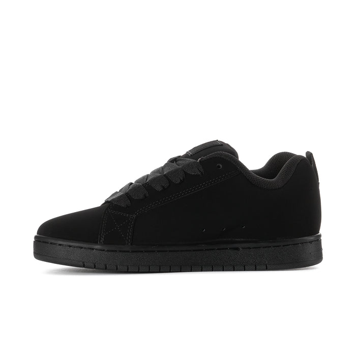 Black low-top skate sneakers, front three-quarter view, lace-up