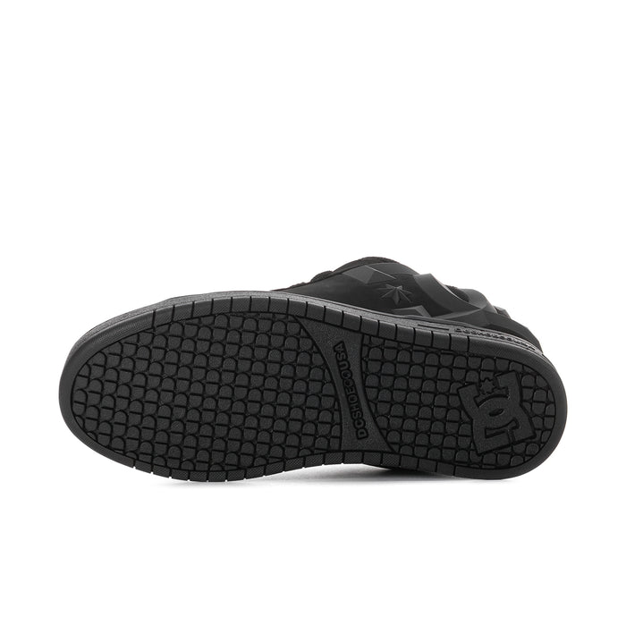 Black rubber outsole with textured tread and DC logo mark