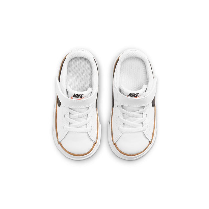 Toddler white sneakers, white laces and padded tongue with NIKE branding