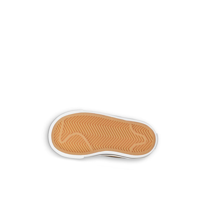 Toddler sneaker outsole with tan tread pattern