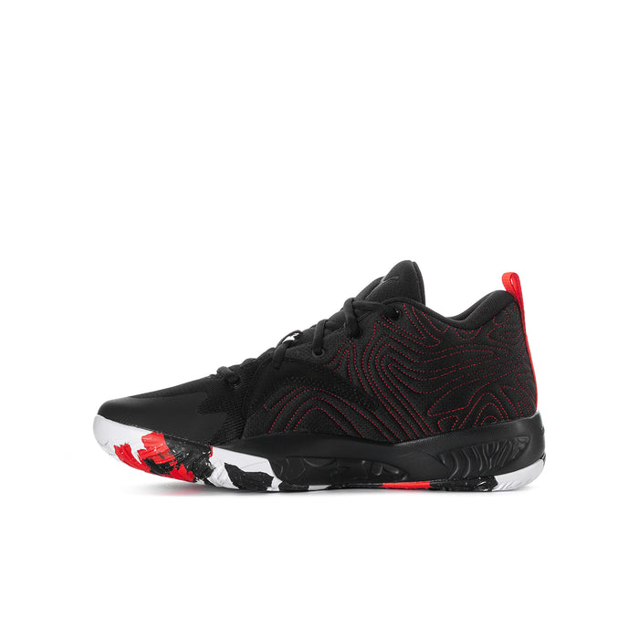 Youth basketball shoe, black with red stripe detail, low-cut lace-up silhouette.