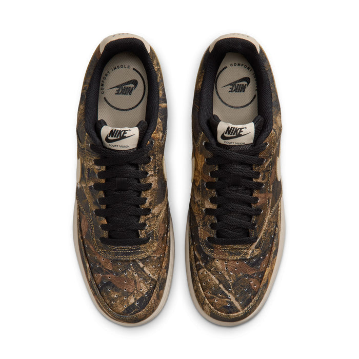Pair of men's low-top sneakers, brown camo uppers with black laces and Nike branding.
