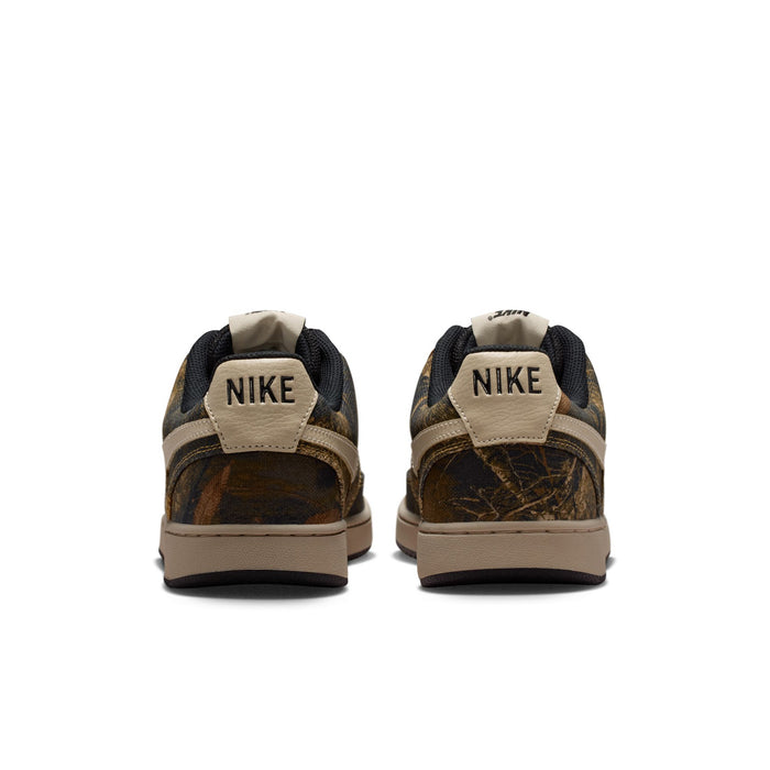 Men's low-top sneakers with black heel tabs and NIKE branding, brown camo uppers.