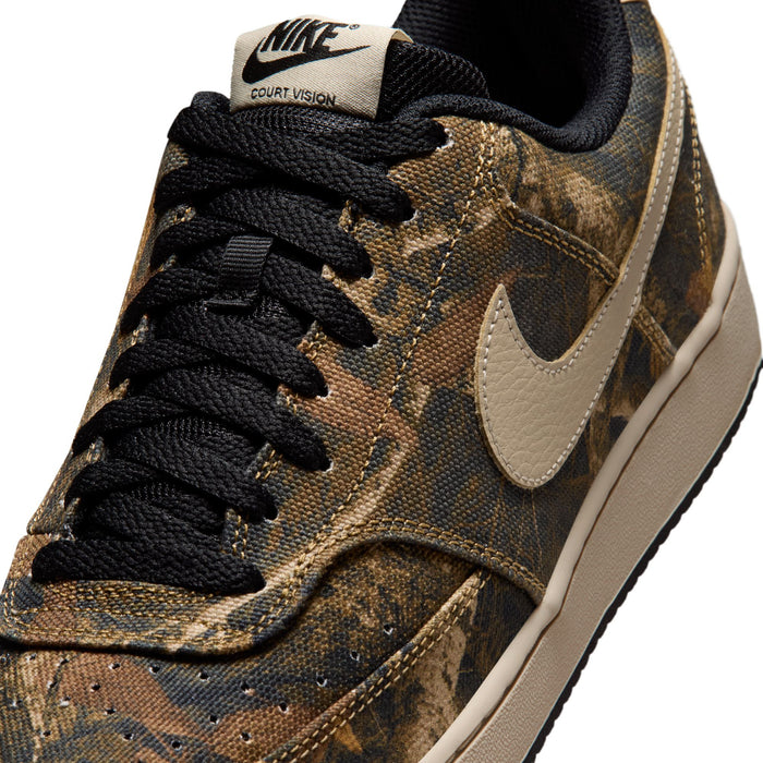 Close-up: men's low-top sneakers with brown camo texture, black laces, and tan Swoosh.