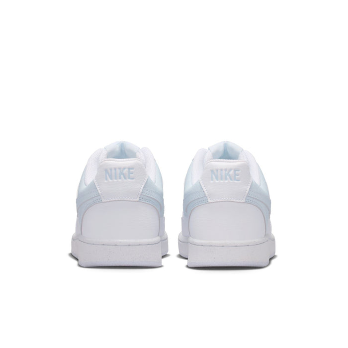 Women's white low-top sneakers, back view with Nike branding on heel.