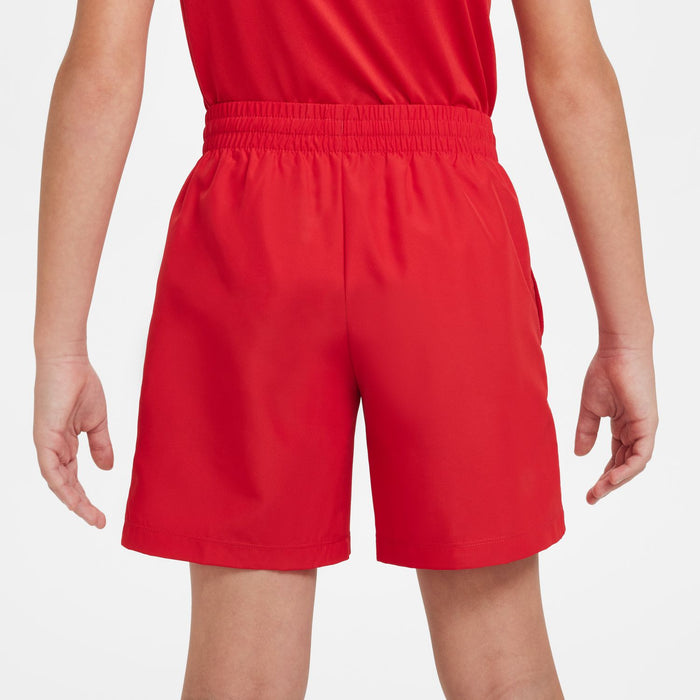 Front view of youth red shorts with elastic waistband and straight hem