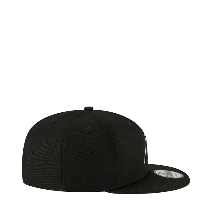 Black baseball cap with side embroidery and curved brim