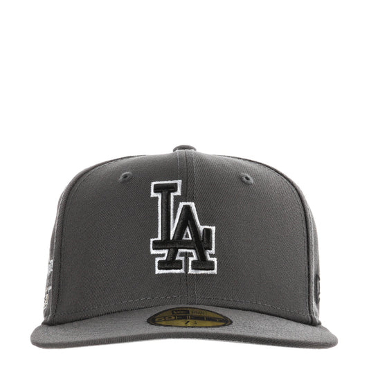 Dark graphite baseball cap with large white-outlined LA logo on front panel