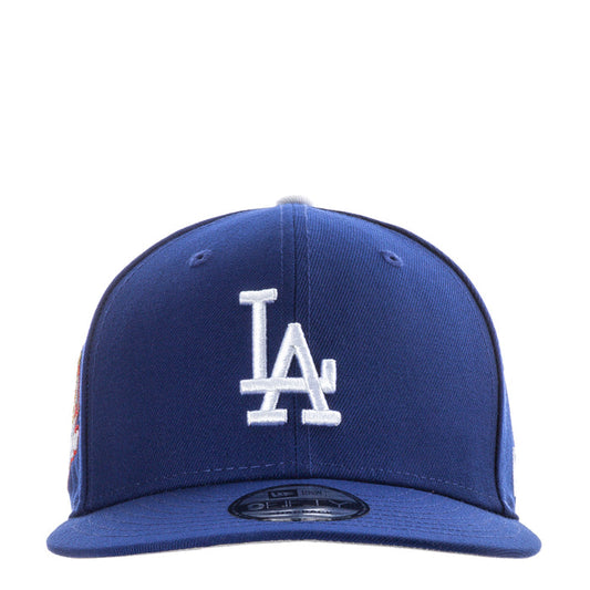 Royal blue baseball cap with white LA logo patch on front