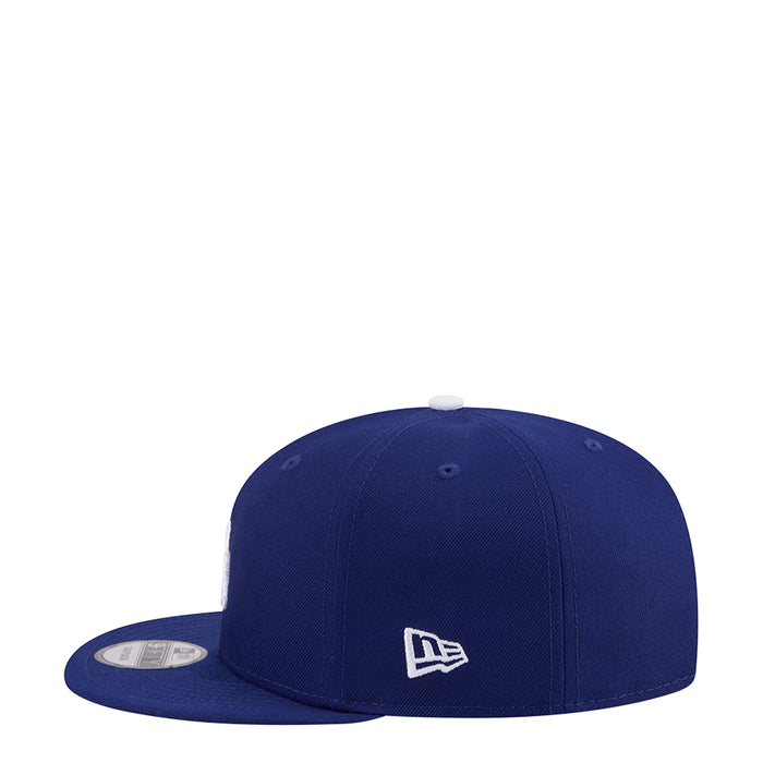 Royal blue baseball cap with small New Era flag logo on side