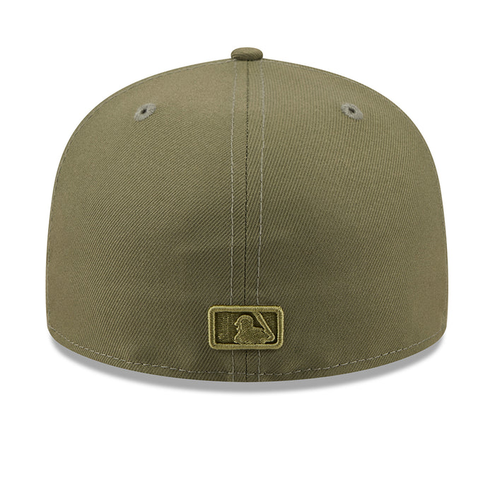 Olive baseball cap with gold MLB logo patch on the back center