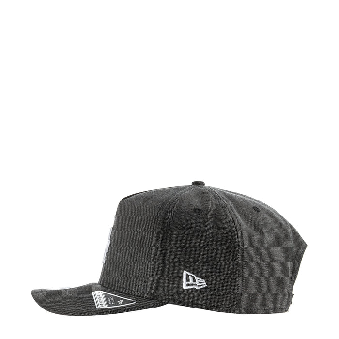 Washed black denim baseball cap with New Era flag logo on side